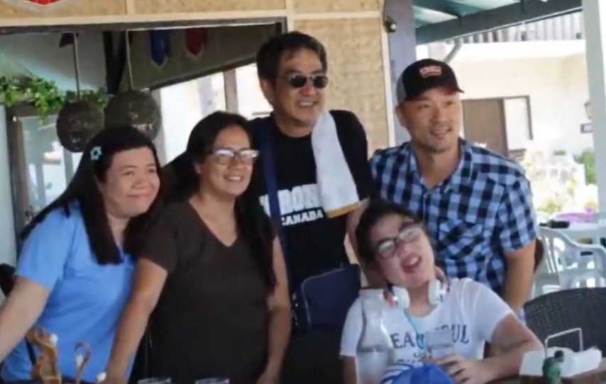 Asha's family with her wishmaker.